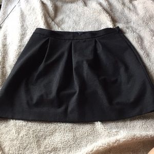 dark gray/black pleated skirt